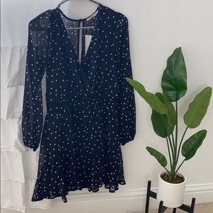 Navy blue polka dot dress.